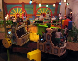 Loading dock and vehicles for those requiring special assistance at Toy Story Midway Mania