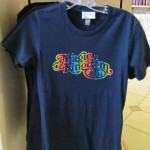 merch-rainbow-tee New rainbow "Magic Kingdom" t-shirt with rhinestones. Shirt is a nice quality too.