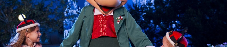 Mickey Mouse at hte Magic Kingdom in his xmas finest