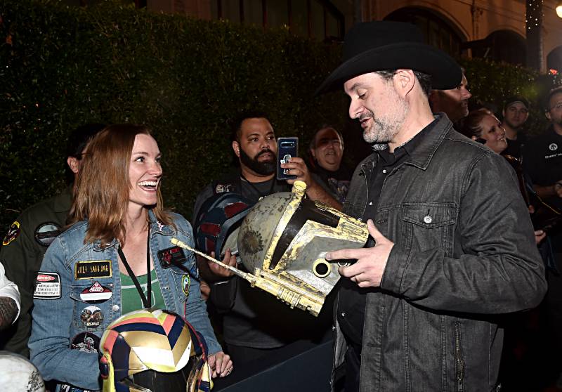 Executive producer/director Dave Filoni (R) arrives at the premiere of Lucasfilm's first-ever, live-action series, "The Mandalorian," at the El Capitan Theatre in Hollywood